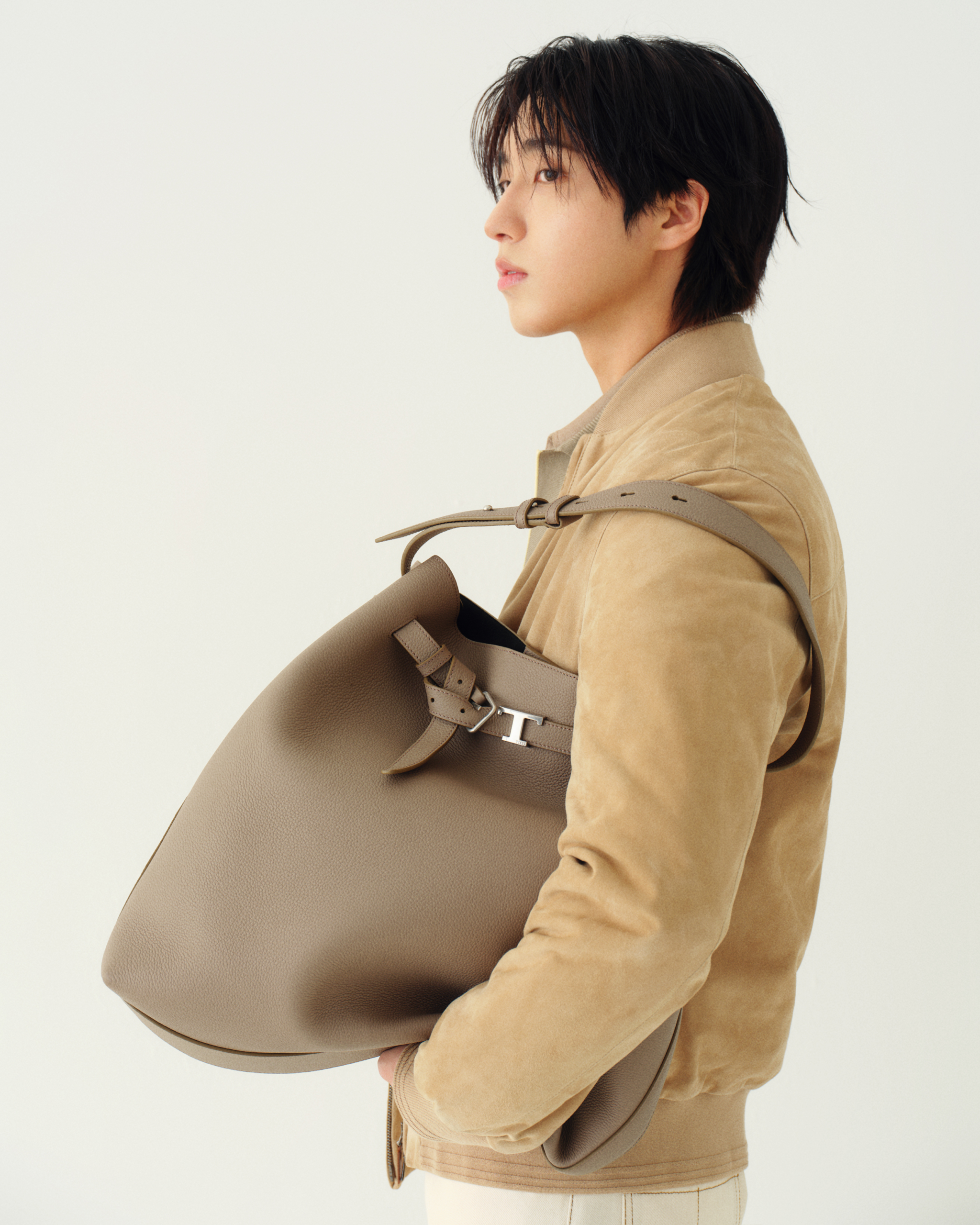 تم الإعلان عن هان عضو فرقة Stray Kids كسفير جديد لعلامة Tod’s التجارية